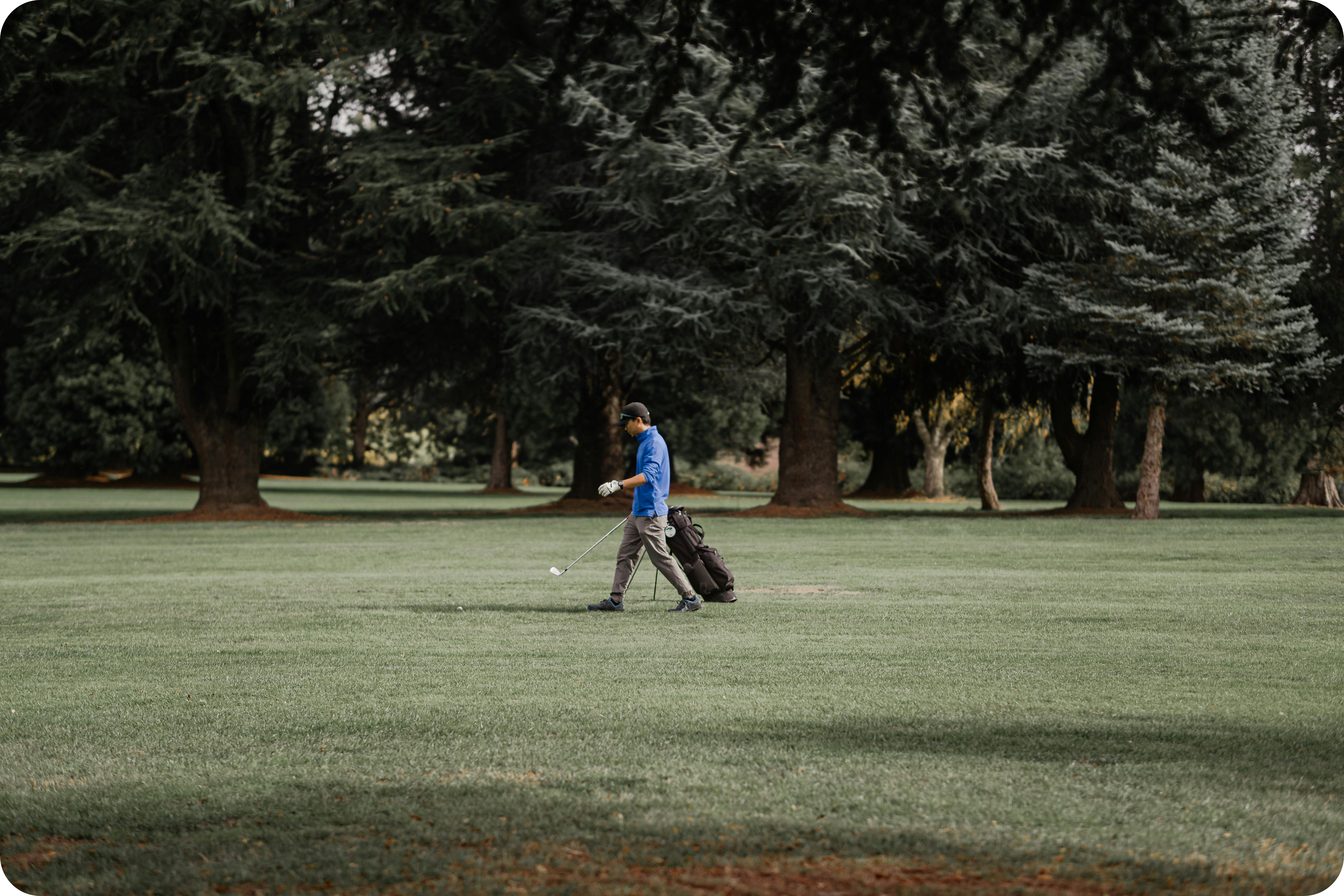 golf cart gps systems golfer walking the fairway