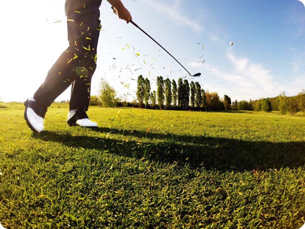 golf cart gps system golfer hitting golf ball